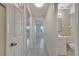 Hallway showcasing tile flooring and doorways leading to bedrooms and the bathroom at 2416 Swailes Dr # 8, Orlando, FL 32837