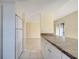 The kitchen features ample countertop space and a seamless transition to the living area at 2416 Swailes Dr # 8, Orlando, FL 32837