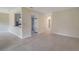 Open living space with tile floors, connecting the living room, dining area, and kitchen at 2416 Swailes Dr # 8, Orlando, FL 32837