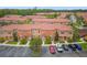 Beautiful residential community featuring multiple townhomes with terra cotta tile roofs and manicured landscaping at 2634 Corvette Ln, Kissimmee, FL 34746