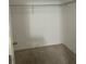 Empty walk-in closet with carpeting and wire shelving ready for storage at 2894 Tanzanite Ter, Kissimmee, FL 34758