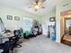 Bedroom with green walls, a ceiling fan and a window providing natural light at 3004 Lake Margaret Dr, Orlando, FL 32806