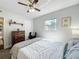 Bedroom with a ceiling fan and a window providing natural light at 3004 Lake Margaret Dr, Orlando, FL 32806