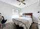 Bedroom with a ceiling fan and a window providing natural light at 3004 Lake Margaret Dr, Orlando, FL 32806