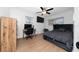 Comfortable bedroom with desk, chair, and bed at 403 Poinciana Cir, Kissimmee, FL 34744