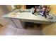 Bathroom vanity with sink, cabinets, and personal items on the counter at 414 Otter Creek Dr, Kissimmee, FL 34743