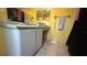 Bathroom vanity with cabinets and sink and a towel rack is visible at 414 Otter Creek Dr, Kissimmee, FL 34743