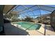 Enclosed pool area, a serene spot with views of the surrounding landscape at 414 Otter Creek Dr, Kissimmee, FL 34743