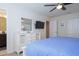 Bright bedroom with large dresser and a comfortable bed at 4768 Kings Castle Cir, Kissimmee, FL 34746