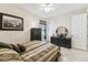 Bedroom featuring neutral paint, tile floors and a queen-sized bed at 538 Via Vitale Ct, Kissimmee, FL 34759