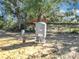 Residential well water system, featuring a Challenger pressure tank in a serene outdoor setting at 6189 Nw 68Th St, Ocala, FL 34482