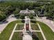 Aerial view of the community clock tower and landscaping at 6441 Point Hancock Dr, Winter Garden, FL 34787