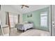 Bright bedroom with tile flooring and french doors leading to outdoor area at 6921 Long Needle Ct, Orlando, FL 32822