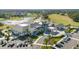 Aerial view of clubhouse with luxurious amenities, including a pool and golf course at 732 Aldenham Ln, Ormond Beach, FL 32174