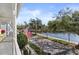 Street view from porch, showcasing the neighborhood with lake at 826 Lake Evalyn Dr, Celebration, FL 34747