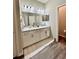 Bathroom featuring a double sink vanity with white cabinets and modern fixtures at 870 Galloway St, Lake Alfred, FL 33850