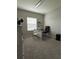 Cozy home office featuring neutral carpet and a desk by the window at 870 Galloway St, Lake Alfred, FL 33850