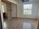 A living room featuring tile floors and an abundance of natural light at 888 Berkley Rd, Auburndale, FL 33823