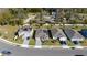 Aerial view of the neighborhood showcasing the well-maintained lawns and modern home designs at 899 Asterfield Ln, Deland, FL 32720