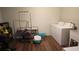 Spacious laundry room featuring washer, dryer, and ample storage space at 911 Kerry Blvd, Winter Haven, FL 33880