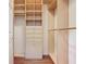 Organized closet with shelves, drawers, and a closet rod at 100 Ventana Dr, Kissimmee, FL 34759