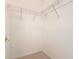 Walk-in closet with wire shelving for optimum organization and storage at 100 Ventana Dr, Kissimmee, FL 34759