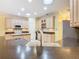 This bright kitchen features an island sink and a skylight for plenty of natural light at 100 Ventana Dr, Kissimmee, FL 34759