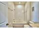 Simple bathroom with a shower-tub combo and neutral finishes at 1111 Oscar Sq, Celebration, FL 34747
