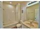 Neutral bathroom featuring a shower-tub combo and single vanity at 1111 Oscar Sq, Celebration, FL 34747