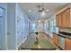 Open floor plan with a large kitchen island and pendant lighting fixtures at 1111 Oscar Sq, Celebration, FL 34747