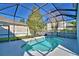 A sparkling pool surrounded by a screen enclosure offers the perfect outdoor retreat at 1111 Oscar Sq, Celebration, FL 34747