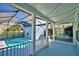 An inviting screened-in pool and covered back porch enhances outdoor living at 1111 Oscar Sq, Celebration, FL 34747