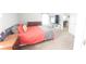 Bright bedroom with an elegant bed and warm decor at 1116 Caloosa Ridge Way, Babson Park, FL 33827