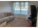 Cozy home office with a modern desk setup and neutral decor at 1116 Caloosa Ridge Way, Babson Park, FL 33827