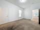 Neutral bedroom with carpet and a window providing natural light at 12791 Westside Village Loop, Windermere, FL 34786