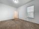 Well-lit carpeted bedroom with a window providing natural light at 12791 Westside Village Loop, Windermere, FL 34786