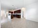 Open concept kitchen with stainless steel appliances and a large center island at 12791 Westside Village Loop, Windermere, FL 34786