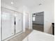 Ensuite bathroom with glass shower and soaking tub at 12791 Westside Village Loop, Windermere, FL 34786