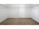 Walk-in closet with wire shelving and carpet flooring at 12791 Westside Village Loop, Windermere, FL 34786