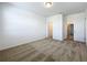 Spacious, carpeted bedroom with two entry doors and ample closet space at 12880 Westside Village Loop, Windermere, FL 34786