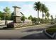 Westside Village entrance with stone signage, vibrant flowers, and swaying palms in a serene, residential neighborhood at 12880 Westside Village Loop, Windermere, FL 34786