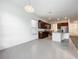 Bright kitchen area with dark wood cabinets and stainless steel appliances at 12971 Westside Village Loop, Windermere, FL 34786