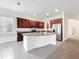 Bright, updated kitchen with granite countertops, stainless appliances, and ample cabinetry at 12971 Westside Village Loop, Windermere, FL 34786