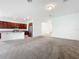 Open concept living area with kitchen and stainless steel appliances at 12971 Westside Village Loop, Windermere, FL 34786