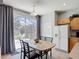 Breakfast nook with backyard views, tile floors, and access to the patio at 131 Stella Pass, Davenport, FL 33837