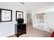Second floor landing featuring a TV on a bureau and a view of the staircase at 131 Stella Pass, Davenport, FL 33837