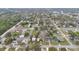 Community aerial view featuring mature trees and houses near the streets at 1518 Ohio Ave, St Cloud, FL 34769