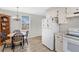 Efficient kitchen space features modern appliances and an adjacent dining area at 1518 Ohio Ave, St Cloud, FL 34769