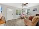 Bright living room features fresh paint, and ample seating, ideal for entertaining at 1518 Ohio Ave, St Cloud, FL 34769