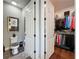 Cozy bathroom featuring a toilet and a door opening into the walk-in closet at 16150 Parkwyn St, Winter Garden, FL 34787